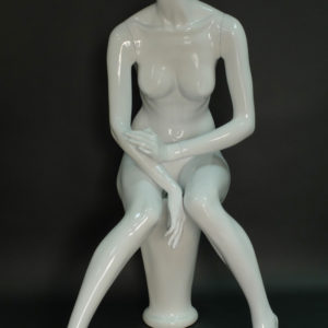 sitting headless female mannequin